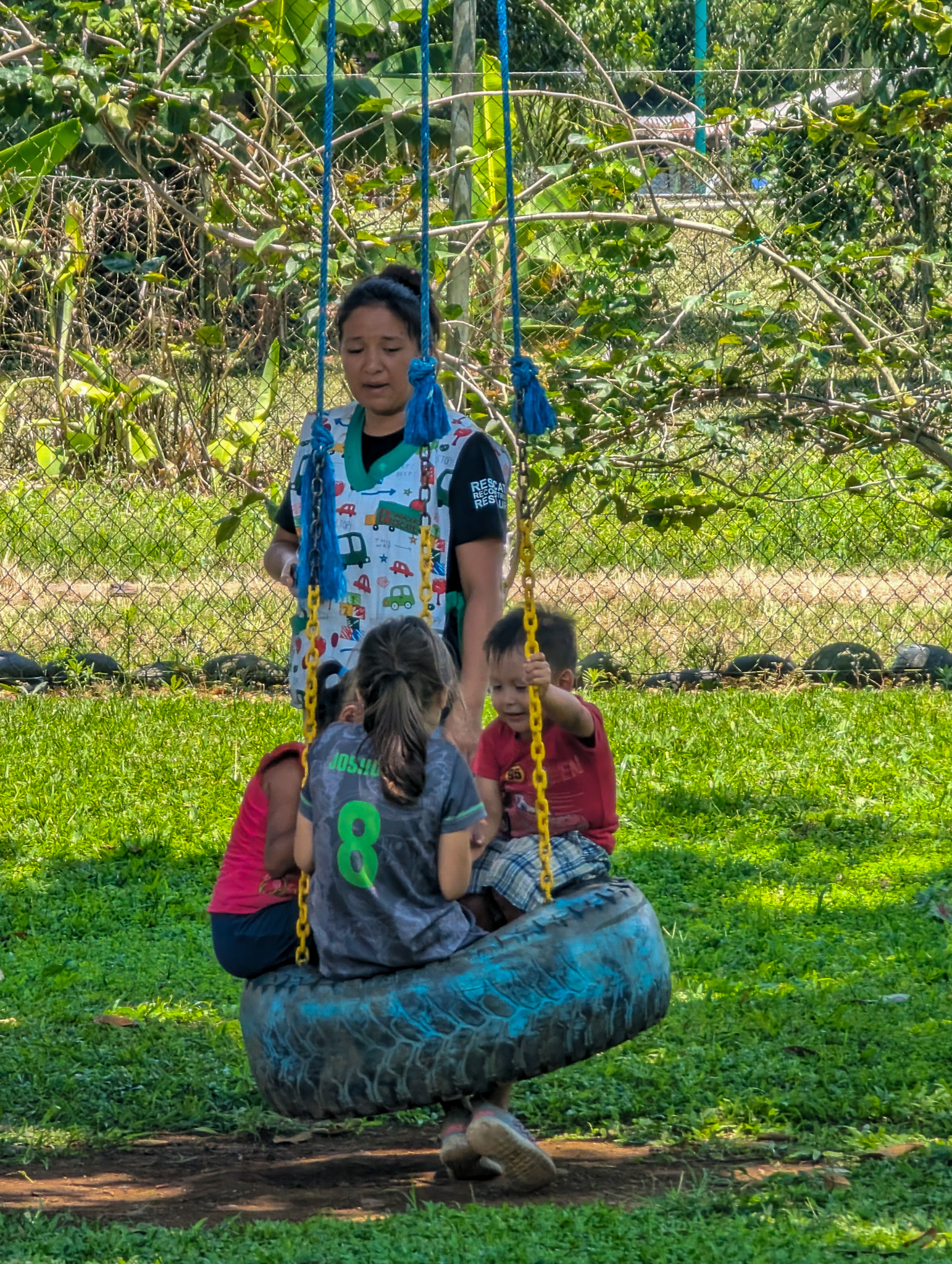 children playing with tires