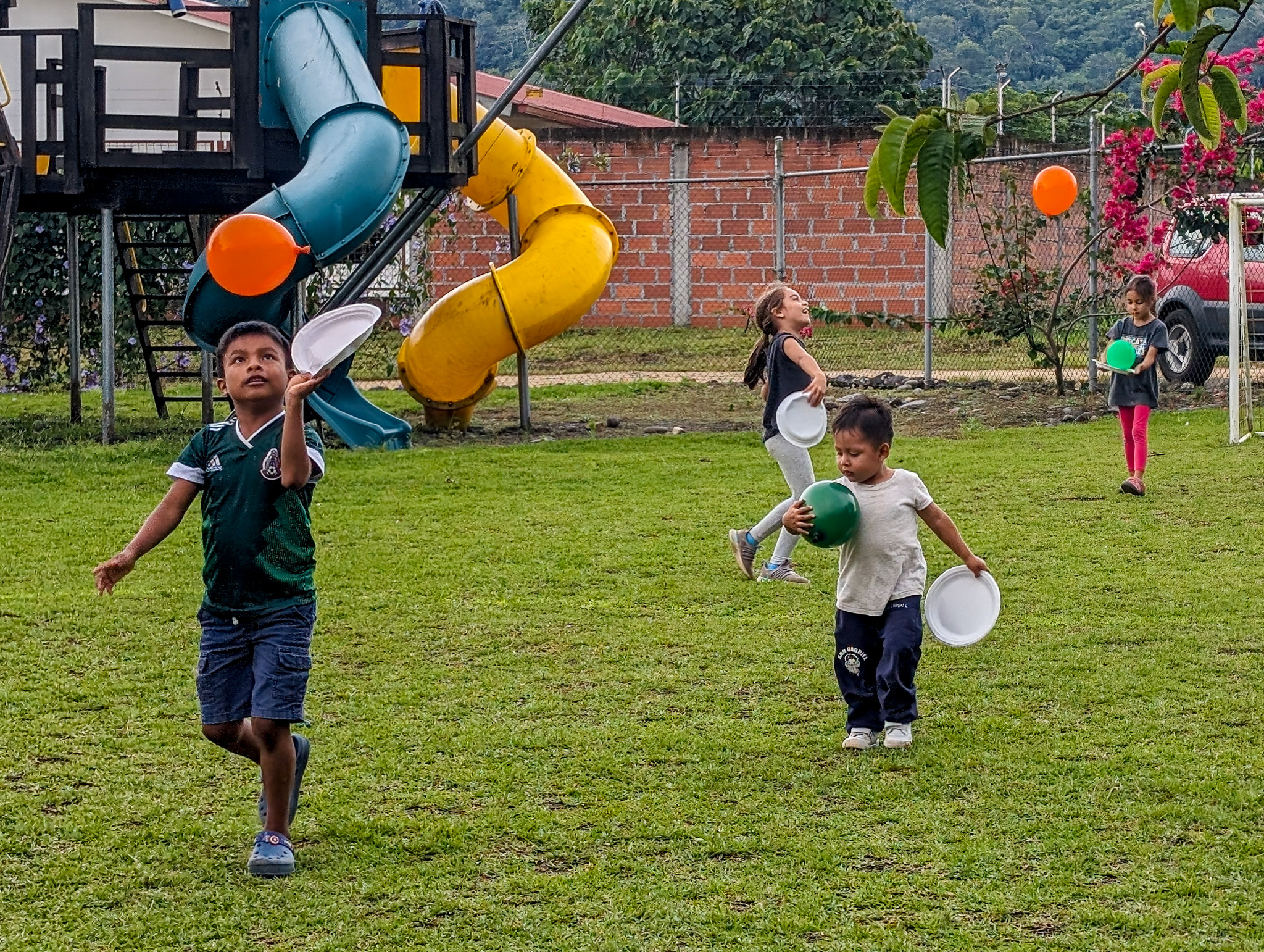 children playing outdoors at the rescue foundation